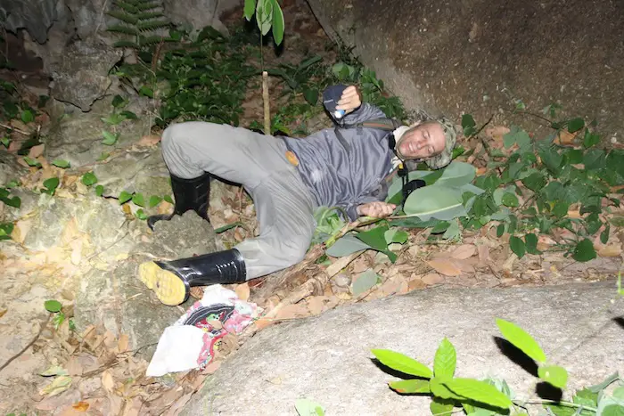 Falling while herping with rubber boots on in Thailand's rainforest.