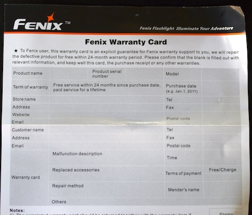 Two year warranty card for Fenix HP25 headlamp unit.