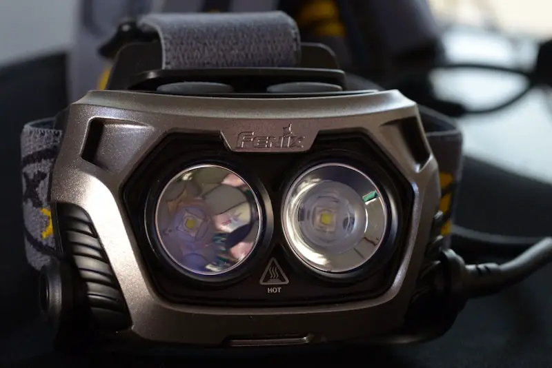 Front view of Fenix HP25 headlamp unit - grey / charcoal colored strap.
