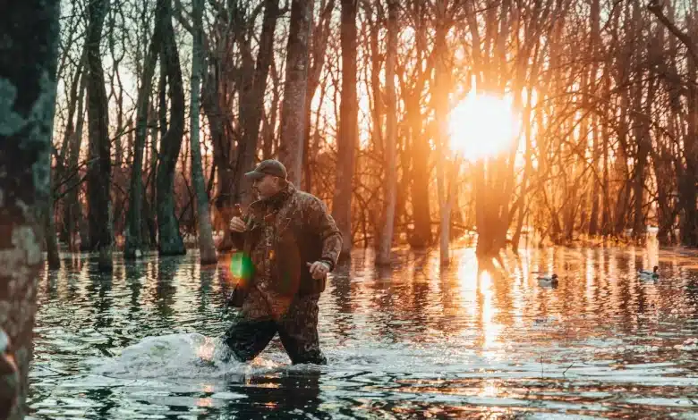 Man Standing in the Water Recommended Herping Gear